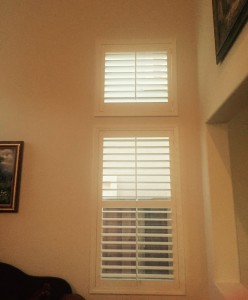 shutters covering windows in a living room